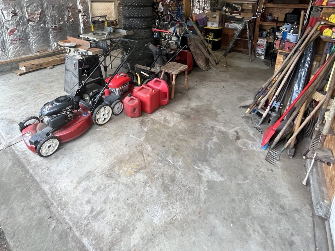Garage after clean-out — floor cleared and space reclaimed